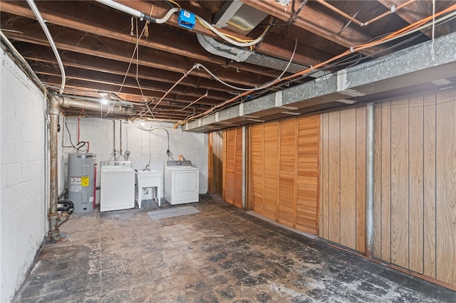 1332 Rte 519, North Strabane, PA 15330 - unfinished basement with electric water heater, separate washer and dryer, and a sink