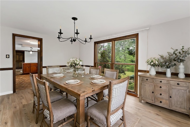 4117 Kellington Ct, Murrysville, PA 15668 - dining area featuring a chandelier and light wood-type flooring