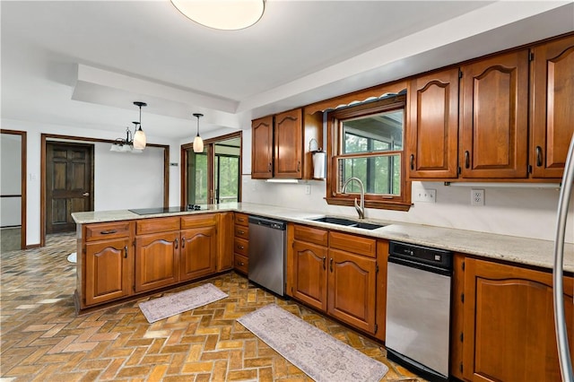 4117 Kellington Ct, Murrysville, PA 15668 - kitchen featuring stainless steel dishwasher, a peninsula, light countertops, and brown cabinetry