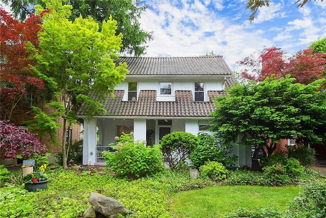 2219 Beechwood Blvd, Squirrel Hill, PA 15217 - back of house with a tiled roof, stucco siding, and covered porch