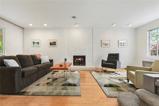 2219 Beechwood Blvd, Squirrel Hill, PA 15217 - living area featuring wood finished floors, a fireplace, and recessed lighting