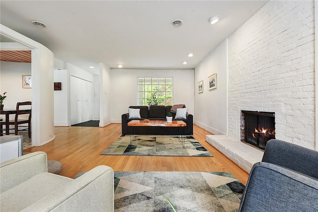 2219 Beechwood Blvd, Squirrel Hill, PA 15217 - living area with wood finished floors, a fireplace, baseboards, and recessed lighting