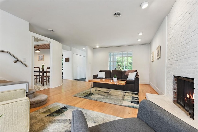 2219 Beechwood Blvd, Squirrel Hill, PA 15217 - living area featuring wood finished floors and a brick fireplace