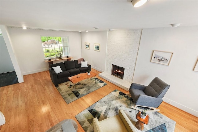 2219 Beechwood Blvd, Squirrel Hill, PA 15217 - living room with a fireplace, wood finished floors, and baseboards
