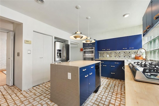 2219 Beechwood Blvd, Squirrel Hill, PA 15217 - kitchen featuring stainless steel appliances, blue cabinetry, a kitchen island, backsplash, and light countertops