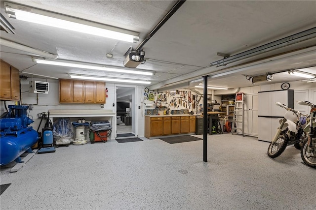 1509 Ingomar Heights Rd, Franklin Park, PA 15237 - garage with a garage door opener, a workshop area, and a heating unit