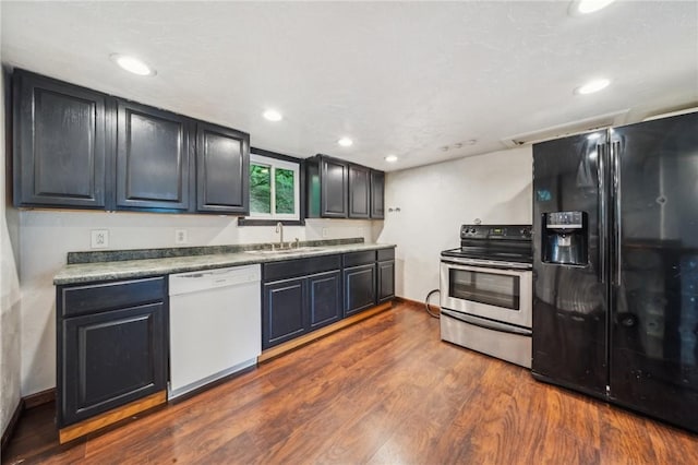 914 Western Ave, Jeannette, PA 15644 - kitchen featuring white dishwasher, black fridge with ice dispenser, stainless steel range with electric stovetop, a sink, and dark wood finished floors