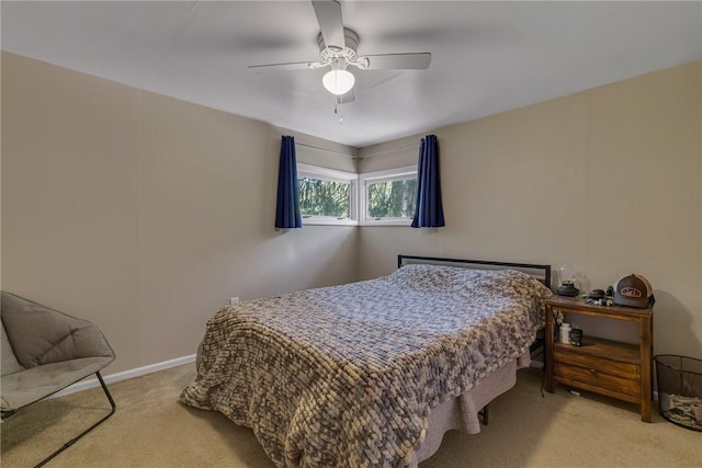 9895 Willow Dr, Mccandless, PA 15090 - bedroom with light colored carpet, ceiling fan, and baseboards