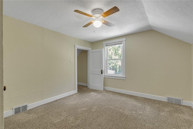 9895 Willow Dr, Mccandless, PA 15090 - additional living space with carpet floors, a textured ceiling, lofted ceiling, ceiling fan, and baseboards