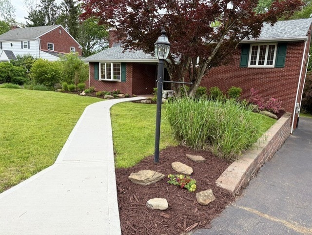 2612 Saybrook Dr, Churchill Boro, PA 15235 - ranch-style house featuring brick siding and a front yard