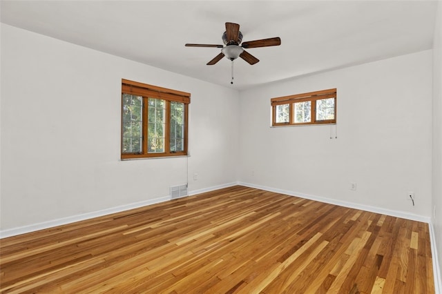 2612 Saybrook Dr, Churchill Boro, PA 15235 - unfurnished room with plenty of natural light, baseboards, a ceiling fan, and light wood-type flooring