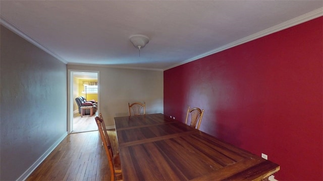 227 Ridge Ave, Forest Hills Boro, PA 15221 - dining area featuring hardwood / wood-style floors, baseboards, and crown molding