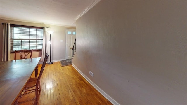 227 Ridge Ave, Forest Hills Boro, PA 15221 - unfurnished dining area featuring crown molding, light wood-type flooring, and baseboards