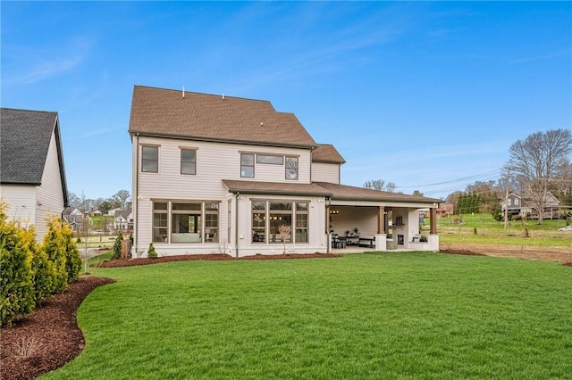 205 Rothaar Ct, Peters Twp, PA 15367 - rear view of house featuring a patio, a yard, and a shingled roof