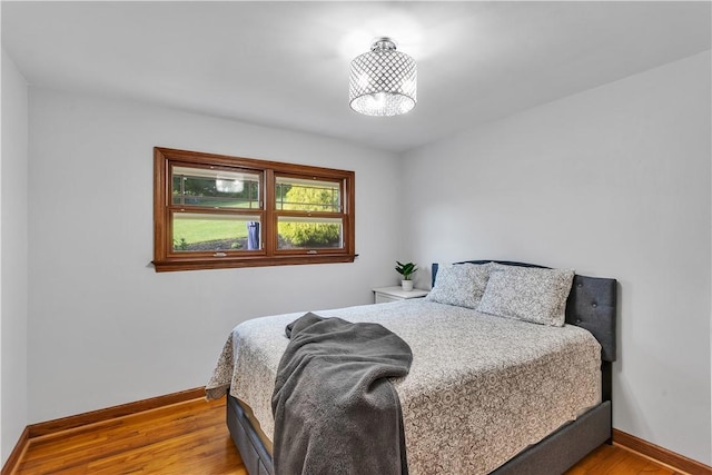 360 Orr Ave, Allegheny Twp, PA 15613 - bedroom featuring baseboards and wood finished floors