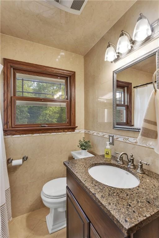 360 Orr Ave, Allegheny Twp, PA 15613 - bathroom featuring tile walls, vanity, and tile patterned floors