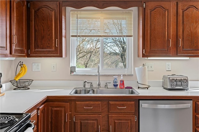 2092 Arnold Acres Dr, Banksville/Westwood, PA 15205 - kitchen with stainless steel dishwasher, a sink, and light countertops