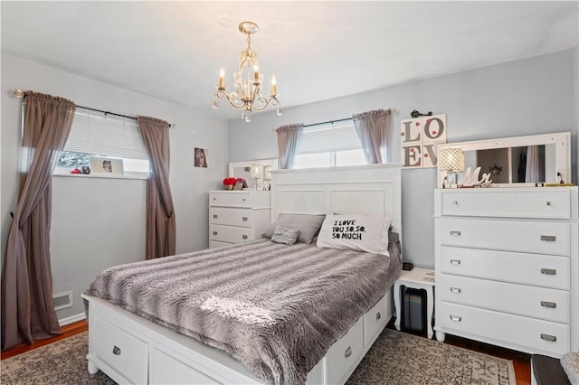 2092 Arnold Acres Dr, Banksville/Westwood, PA 15205 - bedroom with a chandelier and dark wood-style floors