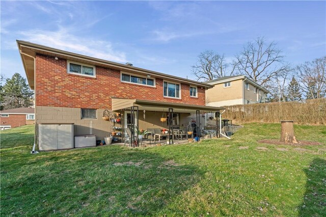 2092 Arnold Acres Dr, Banksville/Westwood, PA 15205 - back of property featuring brick siding and a patio area