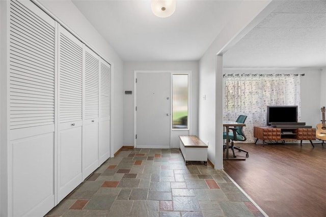 1111 Oriole Dr, Green Tree, PA 15220 - entryway with baseboards and stone tile flooring
