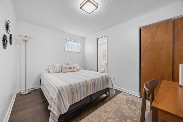 1111 Oriole Dr, Green Tree, PA 15220 - bedroom featuring wood finished floors, connected bathroom, and baseboards