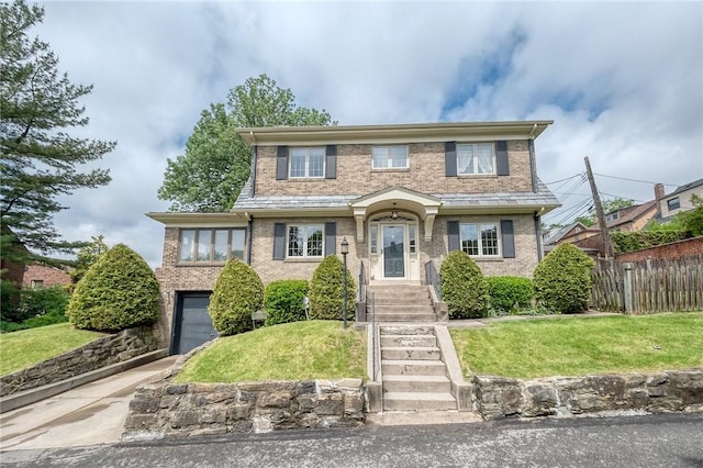 7533 Graymore Rd, Point Breeze, PA 15221 - traditional home featuring driveway, an attached garage, and brick siding