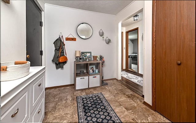 1556 Fairmont St, Wilkinsburg, PA 15221 - bathroom with baseboards, stone finish flooring, and a textured ceiling