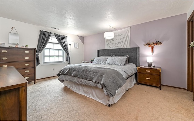 1556 Fairmont St, Wilkinsburg, PA 15221 - bedroom with light colored carpet, a textured ceiling, and baseboards