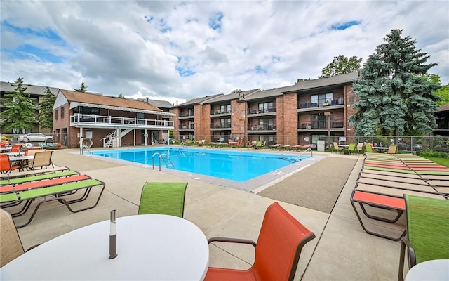1556 Fairmont St, Wilkinsburg, PA 15221 - community pool featuring a patio and stairway