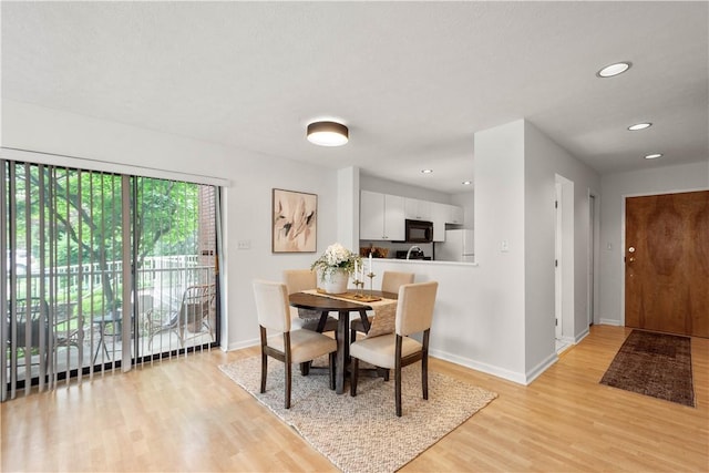 100 Denniston St Unit 211, Shadyside, PA 15206 - dining room featuring baseboards, light wood finished floors, and recessed lighting