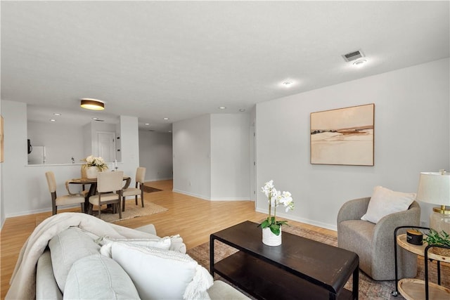 100 Denniston St Unit 211, Shadyside, PA 15206 - living area featuring light wood-type flooring, baseboards, and recessed lighting