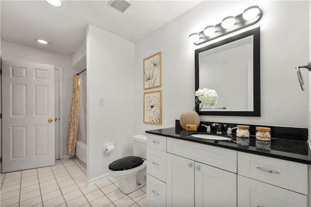 100 Denniston St Unit 211, Shadyside, PA 15206 - bathroom featuring vanity, tile patterned flooring, toilet, shower / bath combo, and baseboards