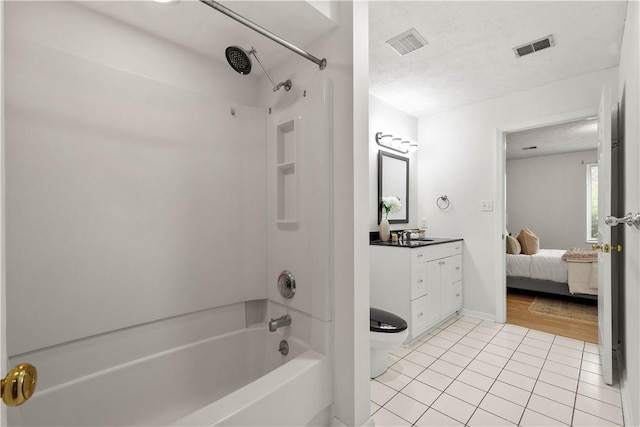 100 Denniston St Unit 211, Shadyside, PA 15206 - full bath with bathing tub / shower combination, vanity, tile patterned flooring, ensuite bathroom, and toilet