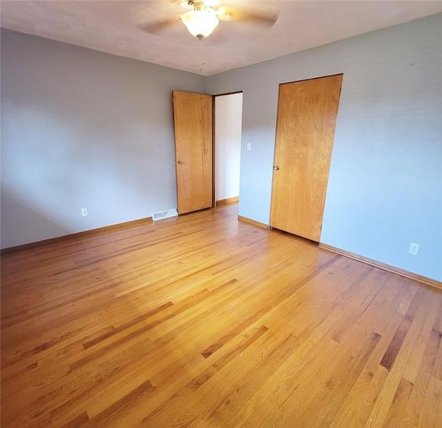 2216 Manor Dr, Manor Twp, PA 16226 - unfurnished bedroom with light wood-style floors, baseboards, and ceiling fan