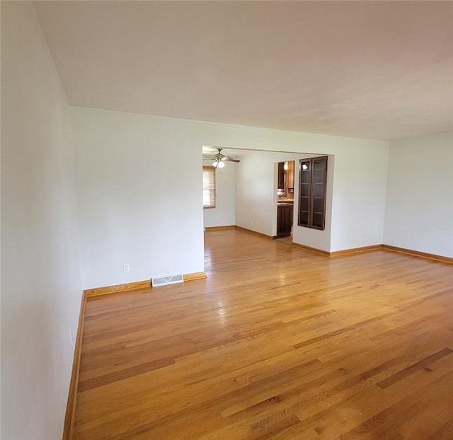 2216 Manor Dr, Manor Twp, PA 16226 - unfurnished room featuring light wood-style floors, baseboards, and a ceiling fan