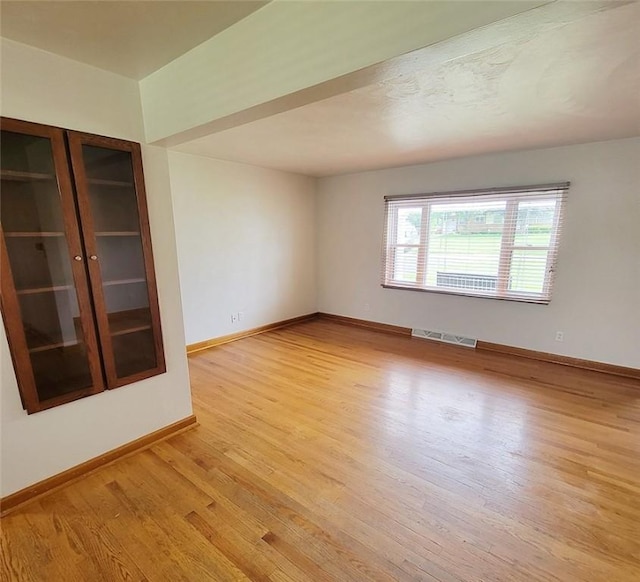 2216 Manor Dr, Manor Twp, PA 16226 - spare room featuring wood finished floors and baseboards
