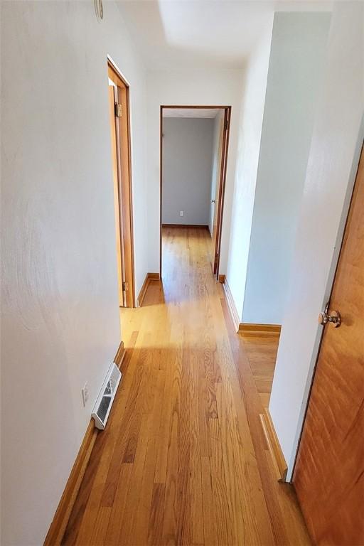 2216 Manor Dr, Manor Twp, PA 16226 - hallway with light wood-type flooring and baseboards