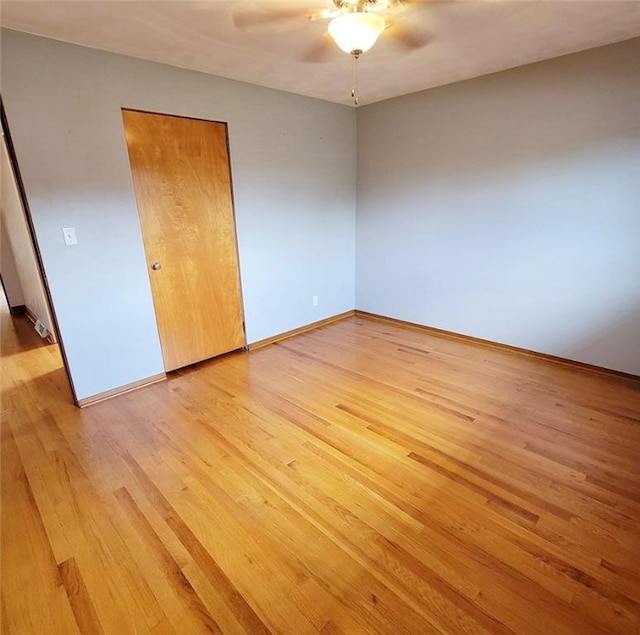2216 Manor Dr, Manor Twp, PA 16226 - empty room featuring a ceiling fan, light wood finished floors, and baseboards