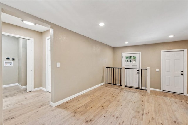 763 W Mountainview Rd, Bullskin Twp, PA 15610 - empty room with wood finished floors, baseboards, and recessed lighting