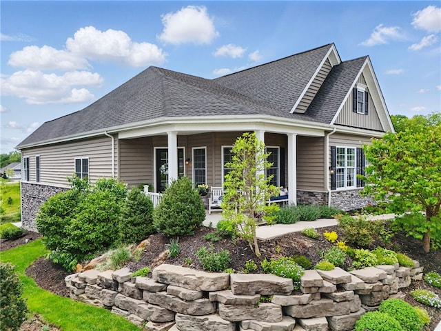 245 Jefferson Ln, Cranberry Twp, PA 16066 - view of front of house featuring roof with shingles, stone siding, and covered porch