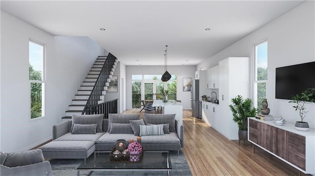 424 Clarence St, West End, PA 15211 - living area featuring wood finished floors and stairs