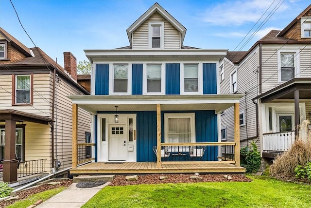 639 Tingley Ave, Bellevue, PA 15202 - traditional style home featuring board and batten siding, a porch, and a front yard