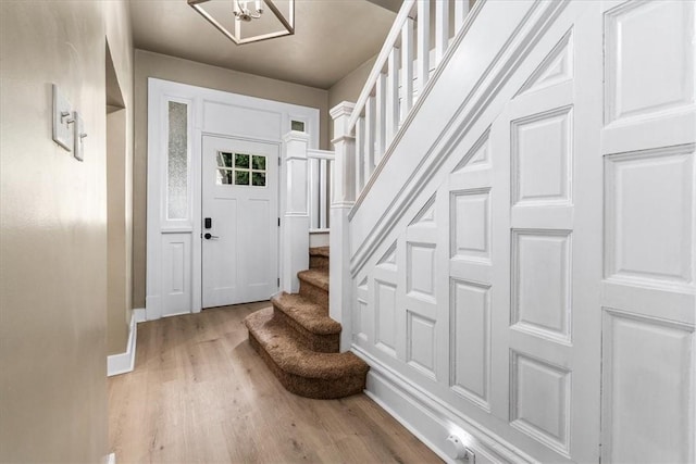 639 Tingley Ave, Bellevue, PA 15202 - entryway with stairway, light wood-style flooring, and baseboards