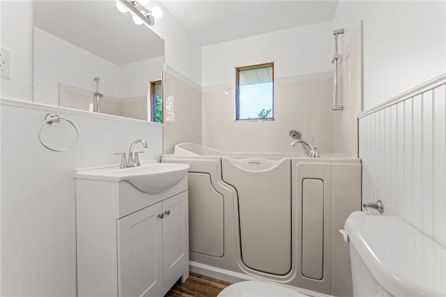 110 Steinbach Ln, Jefferson Hills, PA 15025 - bathroom featuring toilet, a bath, vanity, and wood finished floors