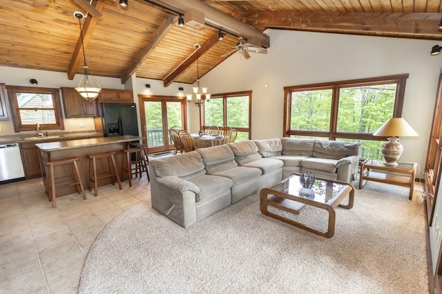 2226 County Line Rd, Donegal Wml, PA 15622 - living area featuring wooden ceiling, light tile patterned flooring, a chandelier, and a ceiling fan