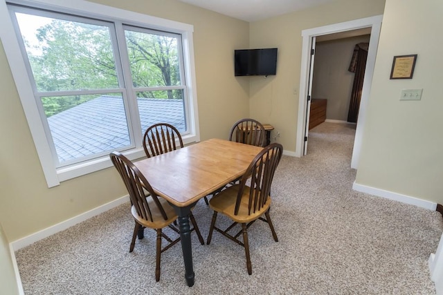2226 County Line Rd, Donegal Wml, PA 15622 - dining area with baseboards and light carpet