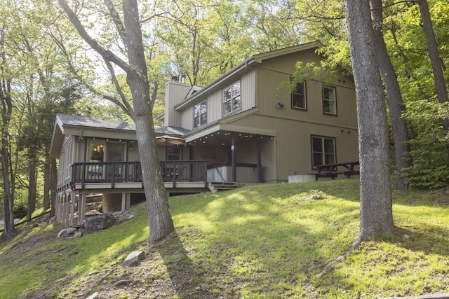 2226 County Line Rd, Donegal Wml, PA 15622 - rear view of house with a yard and a deck
