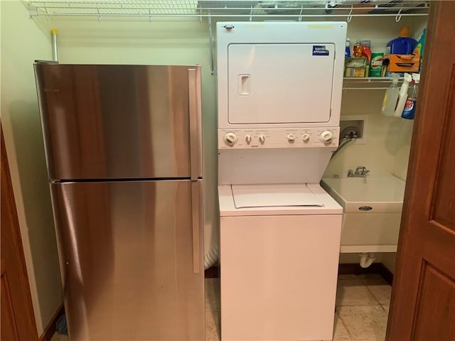 2226 County Line Rd, Donegal Wml, PA 15622 - washroom featuring stacked washing machine and dryer