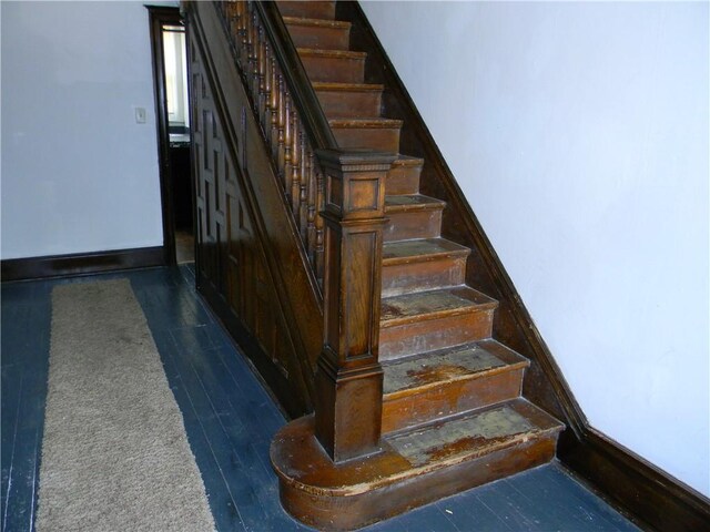 245-247 Semple St, Oakland, PA 15213 - staircase with wood finished floors and baseboards