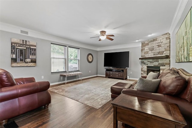 9264 Marshall, Cranberry Twp, PA 16066 - living room with crown molding, a ceiling fan, wood finished floors, a stone fireplace, and baseboards